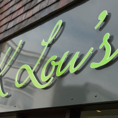 Shop Sign. CNC cut acrylic letters with green vinyl face, Horsham, West Sussex